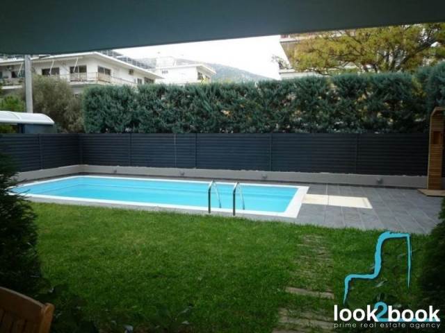 AMAZING APARTMENT WITH COMMON USE SWIMMING POOL IN GLYFADA 
