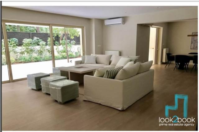 MAISONETTE WITH PRIVATE GARDEN IN GOLF GLYFADA 