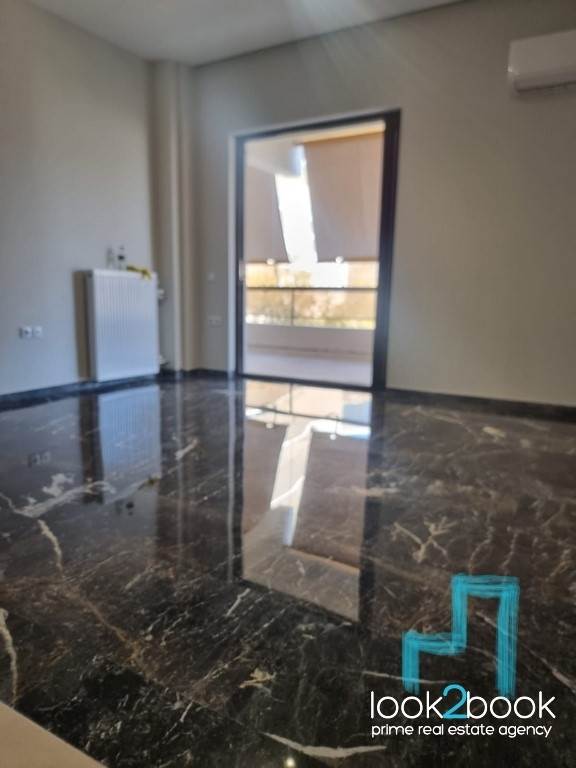 EXCELLENT APARTMENT WITH VIEW IN VERY GOOD CONDITION AT CENTRE OF VOULA 