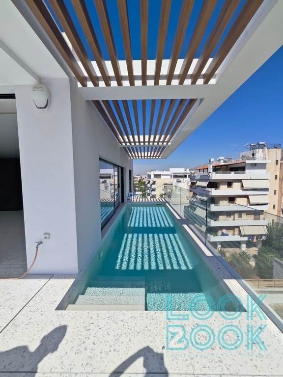 NEWLY BUILT PENTHOUSE MAISONETTE WITH HEATED POOL IN THE CENTER OF VOULA 