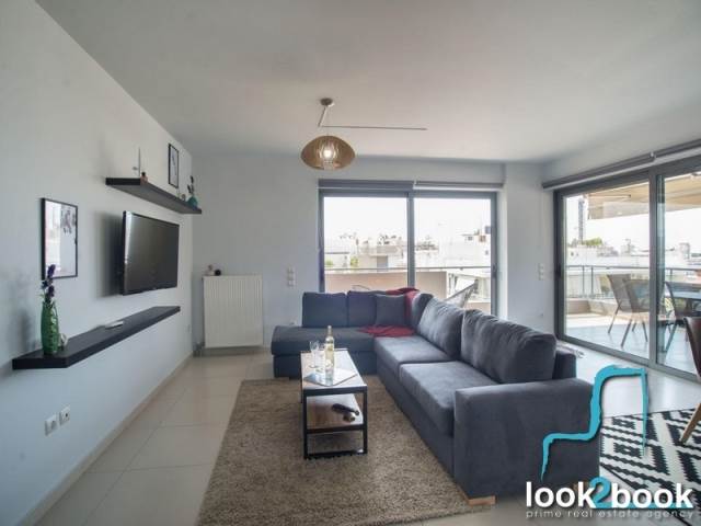 MODERN FURNISHED APARTMENT WITH UNLIMITED VIEW AT THE CENTRE OF GLYFADA 