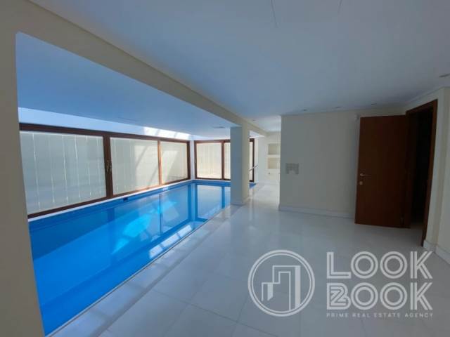 UNIQUE LUXURY FURNISHED  ΑPARTMENT WITH PRIVATE HEATED SWIMMING POOL AND GARDEN IN KATO ELLINIKO 